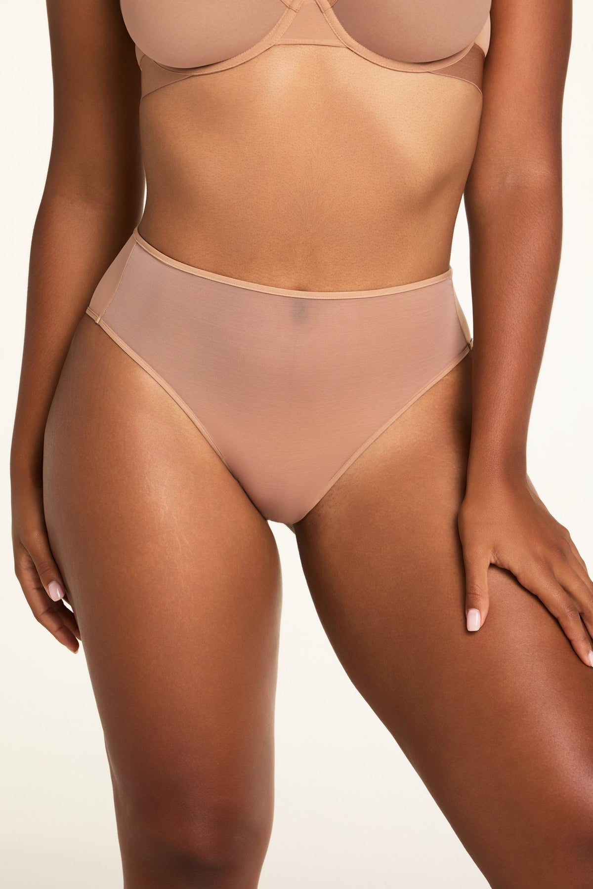 Front on-model shot of the ComfortMesh™ Highwaist Brief in Taupe paired with the ComfortMesh™ Plunge Bra in Taupe. sizing: Amber wears size Large
